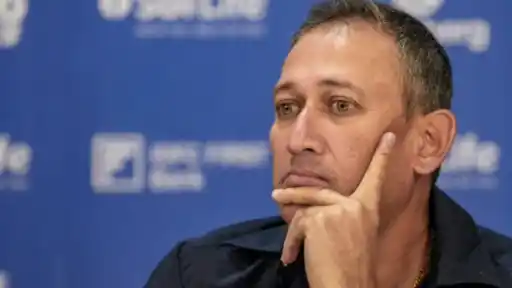 Ajit Agarkar looks pensive during a BCCI press conference amid reports his chief selector contract may not be extended
