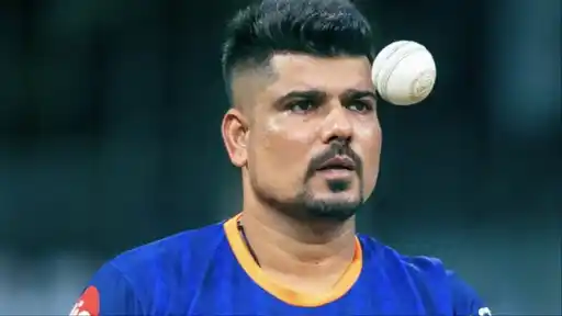 Karn Sharma in Mumbai Indians kit, looking on during a training session, ahead of announcing his retirement from all cricket
