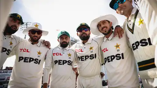 Pakistan players huddle together on the field at Lord's, as major squad changes are reported ahead of the third Test against England