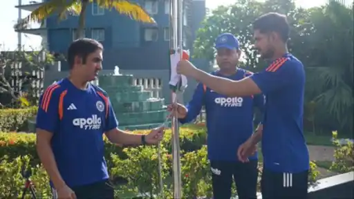 Shubman Gill and Gautam Gambhir hoist the Indian tricolour with the support staff at the team hotel in Galle on Independence Day