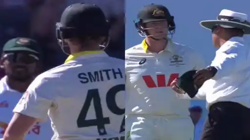 Steve Smith being spoken to by the umpire after telling Bangladesh fielders to review an LBW appeal during the AUS vs BAN 2nd Test