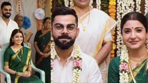 Virat Kohli and Anushka Sharma dressed in traditional South Indian wedding attire with garlands in their viral funny video
