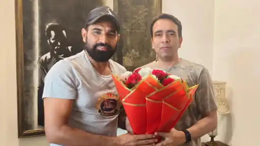 Mohammed Shami with Jayant Chowdhury
