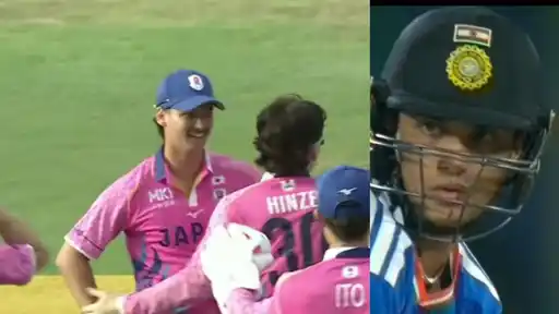 Japan players celebrating a wicket and an India batter in helmet looking on, from the India vs Japan T20I