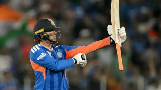 Abhishek Sharma raises his bat after his blistering fifty against Afghanistan in the 1st T20I at Arun Jaitley Stadium, Delhi