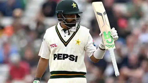Babar Azam raises his bat during Pakistan's tour of England, set to make his first domestic red-ball appearance since 2019 for OGDCL