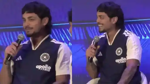 Ishan Kishan speaking at a public event amid controversy over his dinner speech comments