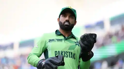 Pakistan wicketkeeper in a Champions Trophy 2025 jersey and gloves, amid the NCCIA investigation