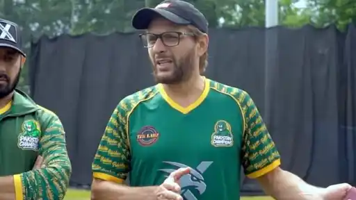 Player in a Pakistan Champions jersey speaks during a session