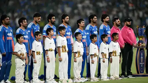 Indian cricket team stands in line for the national anthem ceremony ahead of the historic Vande Mataram rendition before the IND vs AFG 1st T20I in Delhi