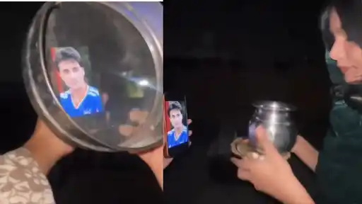 A female fan celebrates Karwa Chauth with a photo of India cricketer Abhishek Sharma after his performance in the New Zealand series.