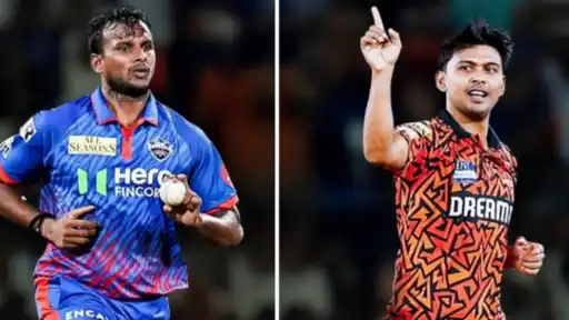 T. Natarajan in Sunrisers Hyderabad orange kit celebrating a wicket alongside teammates during an IPL match