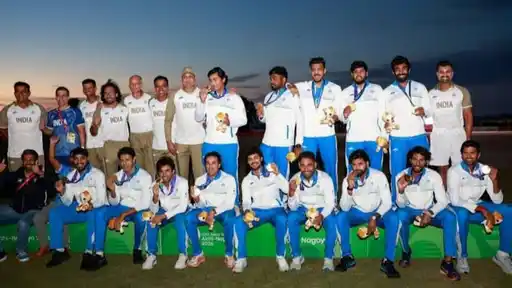 India’s men’s cricket team celebrates with the Asian Games 2026 gold medal after beating Pakistan in the final at Nisshin