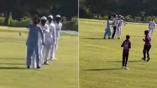 Babar Azam reacts angrily and throws a fan's phone away as players gather on the field during a President's Trophy Grade 1 match